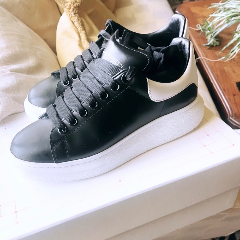 Alexander McQueens black and white , size 7.5 men’s.
